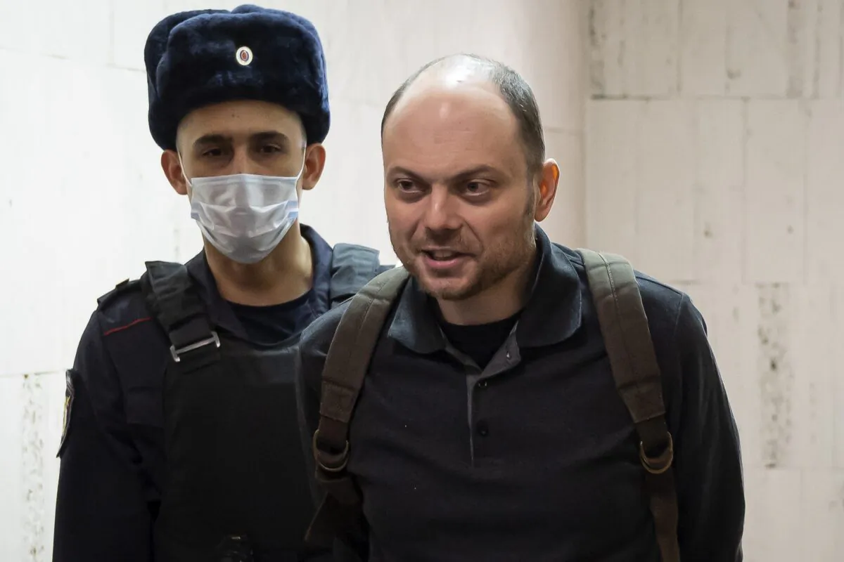 Russian opposition activist Vladimir Kara-Murza is escorted to a hearing in a court in Moscow on Feb. 8, 2023. (AP Photo)
