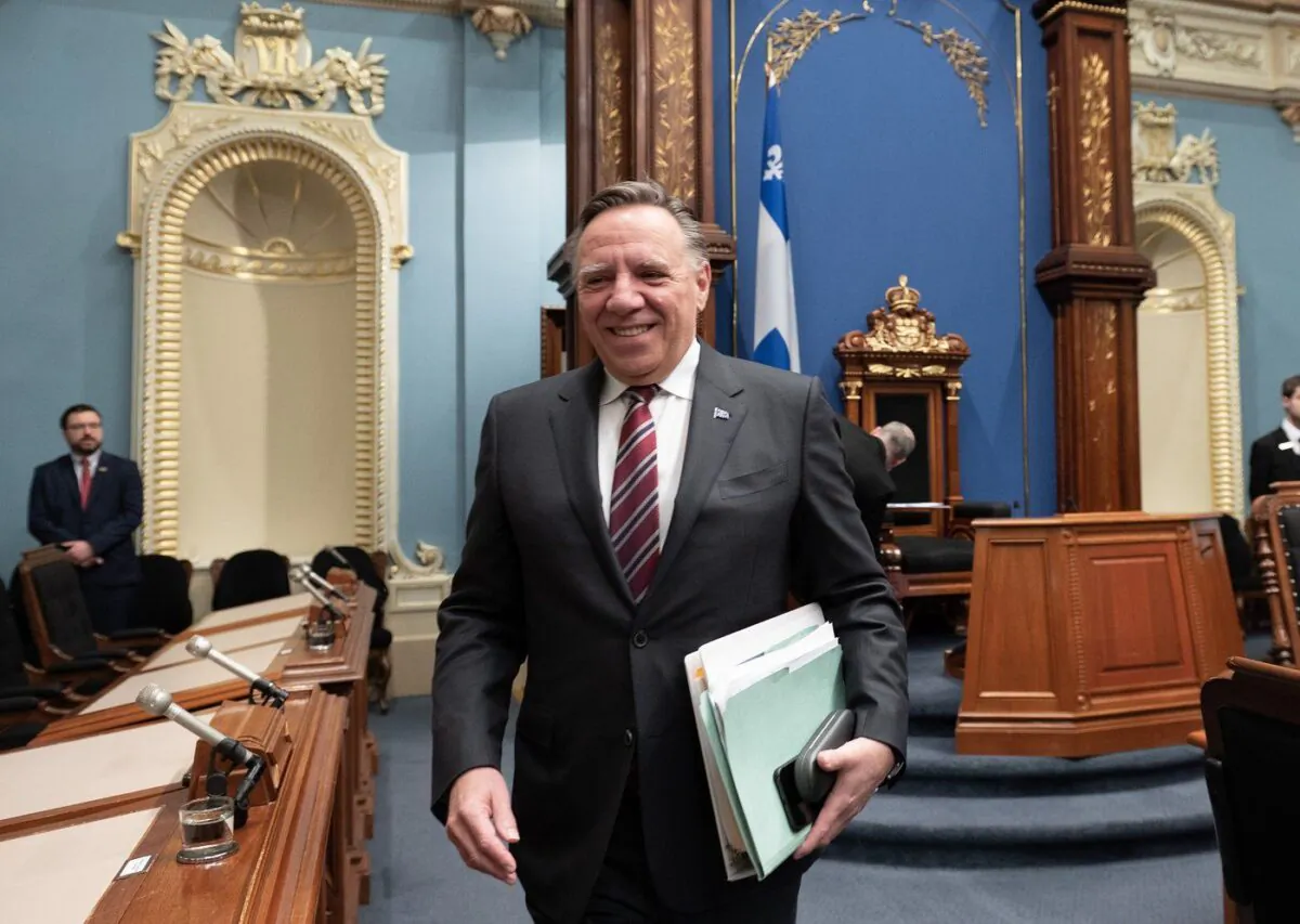 Quebec Premier Francois Legault walks in for question period at the legislature in Quebec City, Feb. 22, 2023. (The Canadian Press/Jacques Boissinot)
