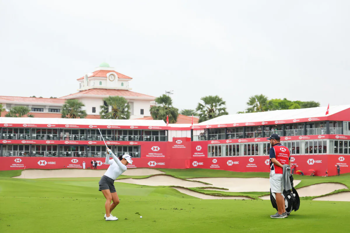 Danielle Kang of The United States plays her second shot on the eighteenth hole during Day Two of the HSBC Women's World Championship at Sentosa Golf Club in Singapore on Mar. 3, 2023. (Andrew Redington/Getty Images)