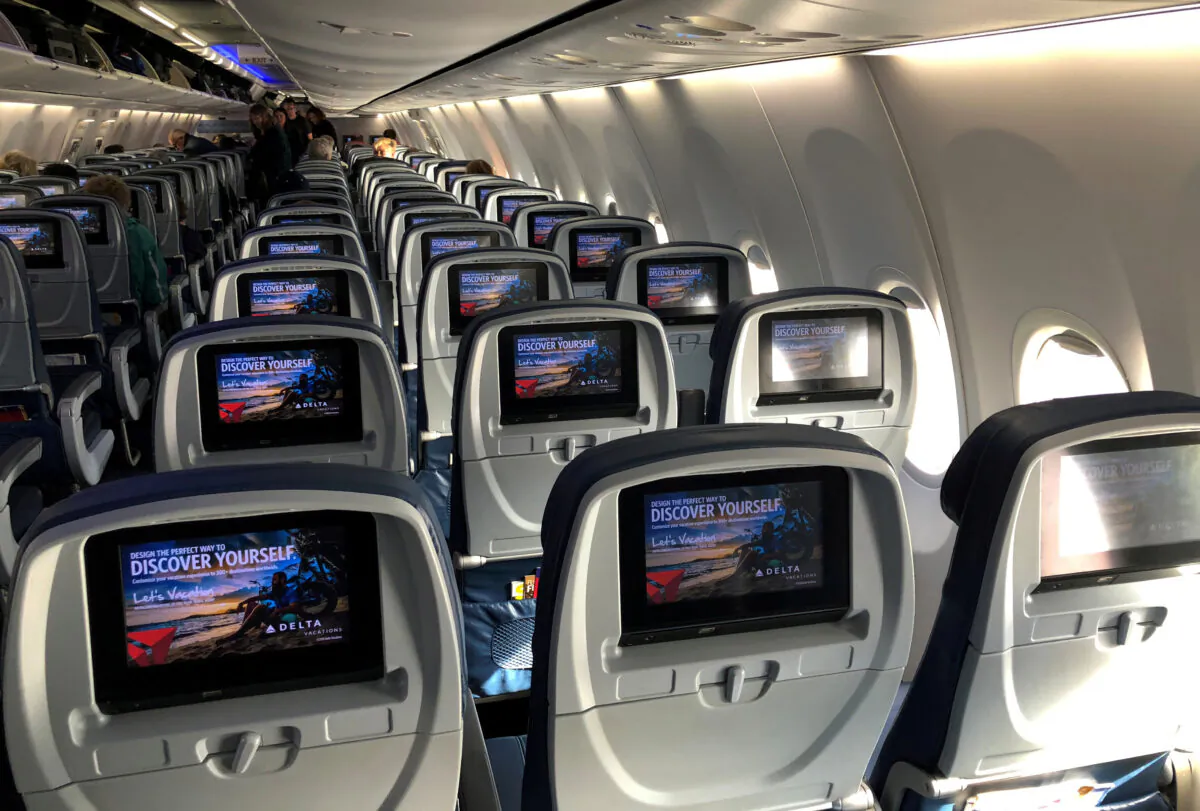 Video screens are shown built into the backs of passenger seats on board a Delta Airlines Boeing 737-900ER aircraft in San Diego on Jan. 10, 2018. (Mike Blake/Reuters)