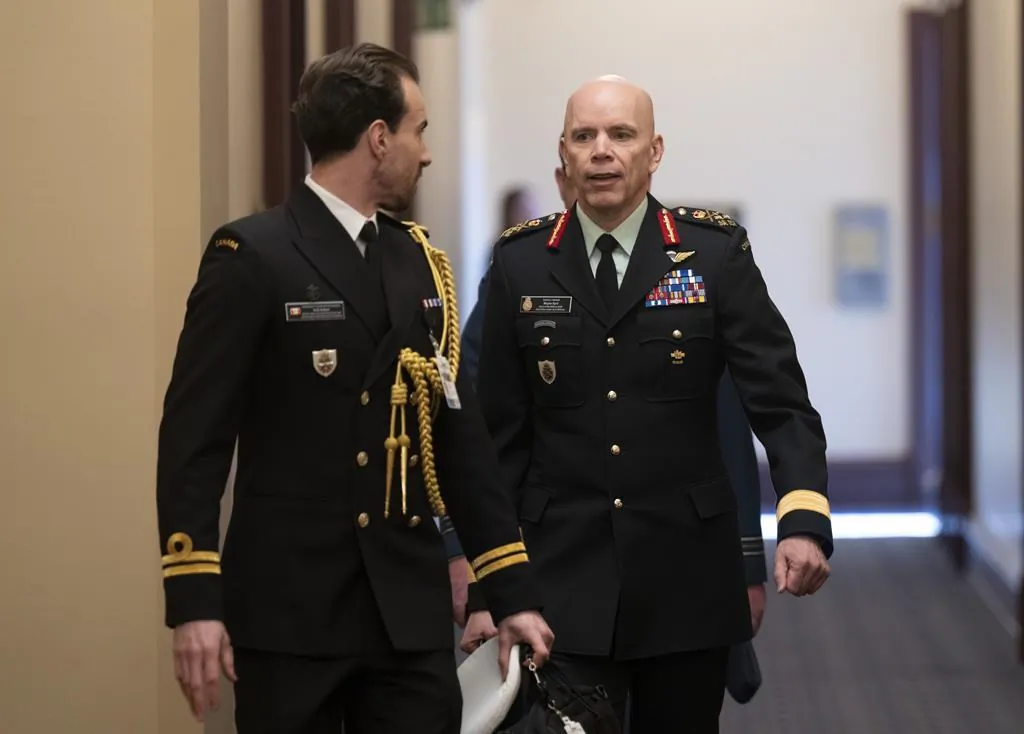 Canada’s Chief of the Defence Staff Wayne Eyre makes his way to attend a cabinet meeting on Parliament Hill, in Ottawa, on Feb. 14, 2023. (The Canadian Press/Adrian Wyld)