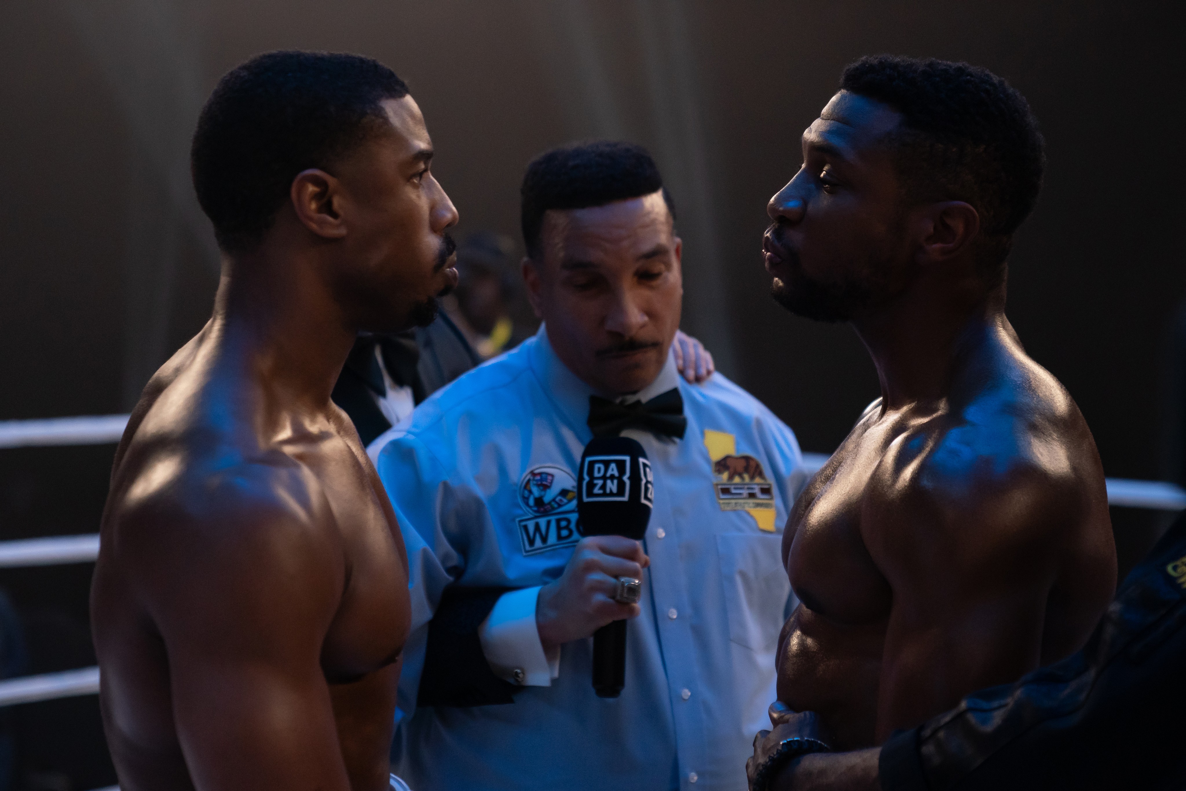 two boxers and referree in Creed III