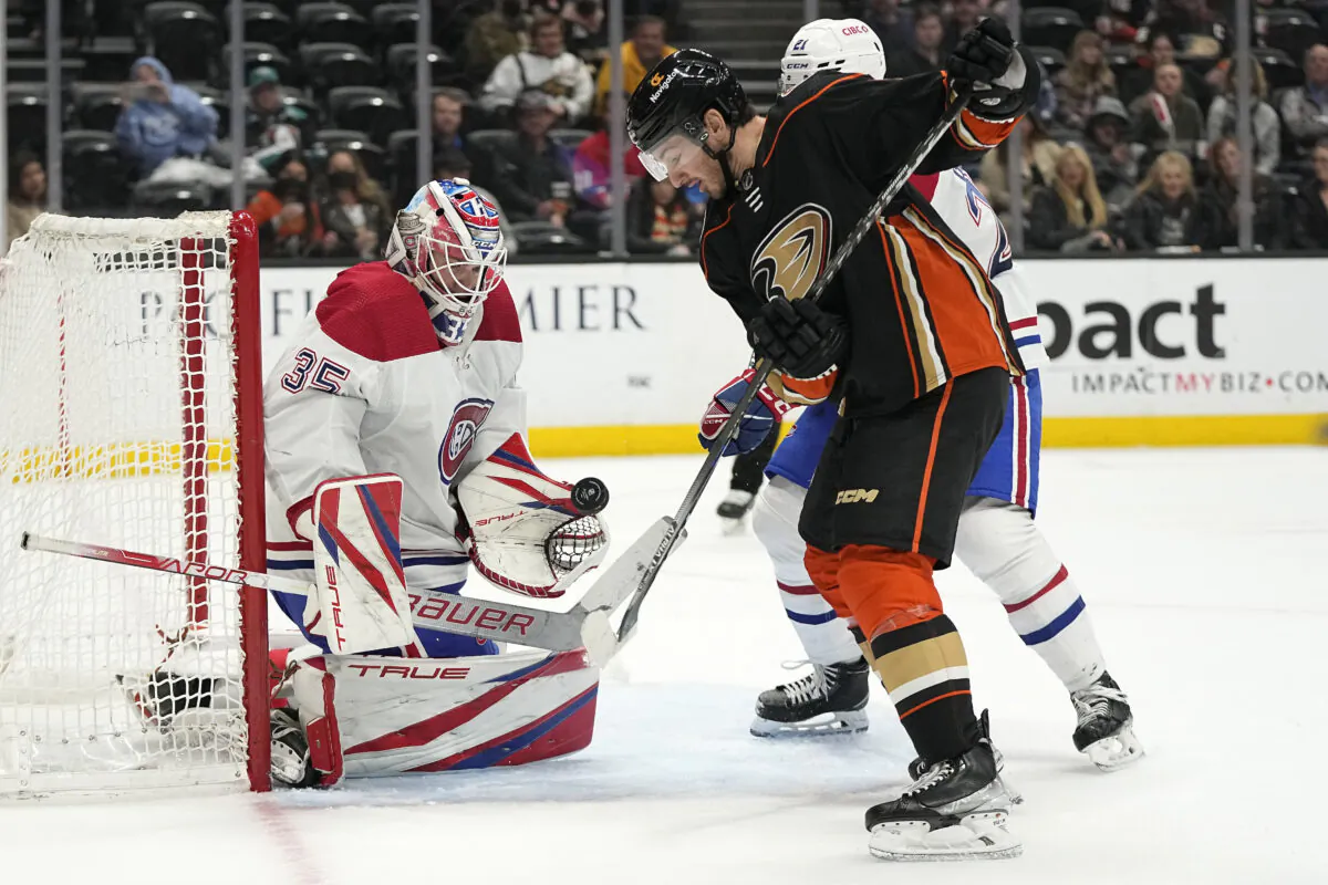 Anaheim Ducks center Jayson Megna, right, tries to get a shot past Montreal Canadiens goaltender Sam Montembeault during the first period of an NHL hockey game in Anaheim, Calif., on Mar. 3, 2023. (Mark J. Terrill/AP Photo)