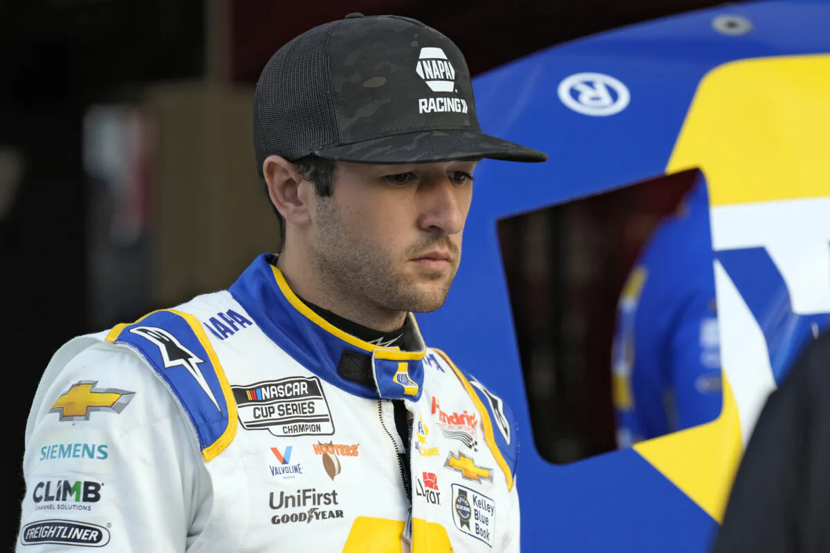 Chase Elliott watches as his crew works on his car during a practice for the NASCAR Daytona 500 auto race, at Daytona International Speedway in Daytona Beach, Fla., on Feb. 17, 2023. (Chris O'Meara/AP Photo)