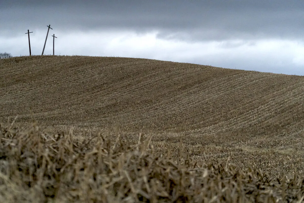 Three crosses stand on a hillside overlooking a farm on the state line of Ohio and Pennsylvania following a train derailment prompting health concerns in East Palestine, Ohio, on Feb. 17, 2023. (Michael Swensen/Getty Images)