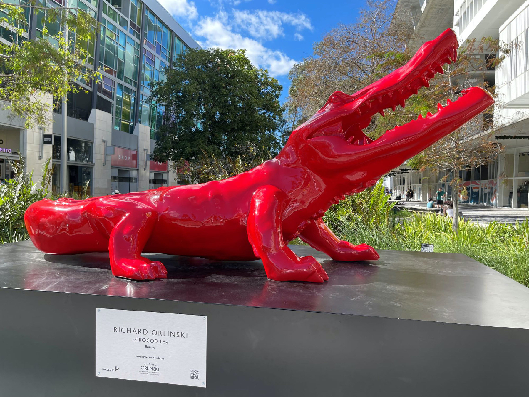 Richard Orlinski’st red crocodile enlivens the Lincoln Road Mall promenade in northern South Beach Miami, Florida.