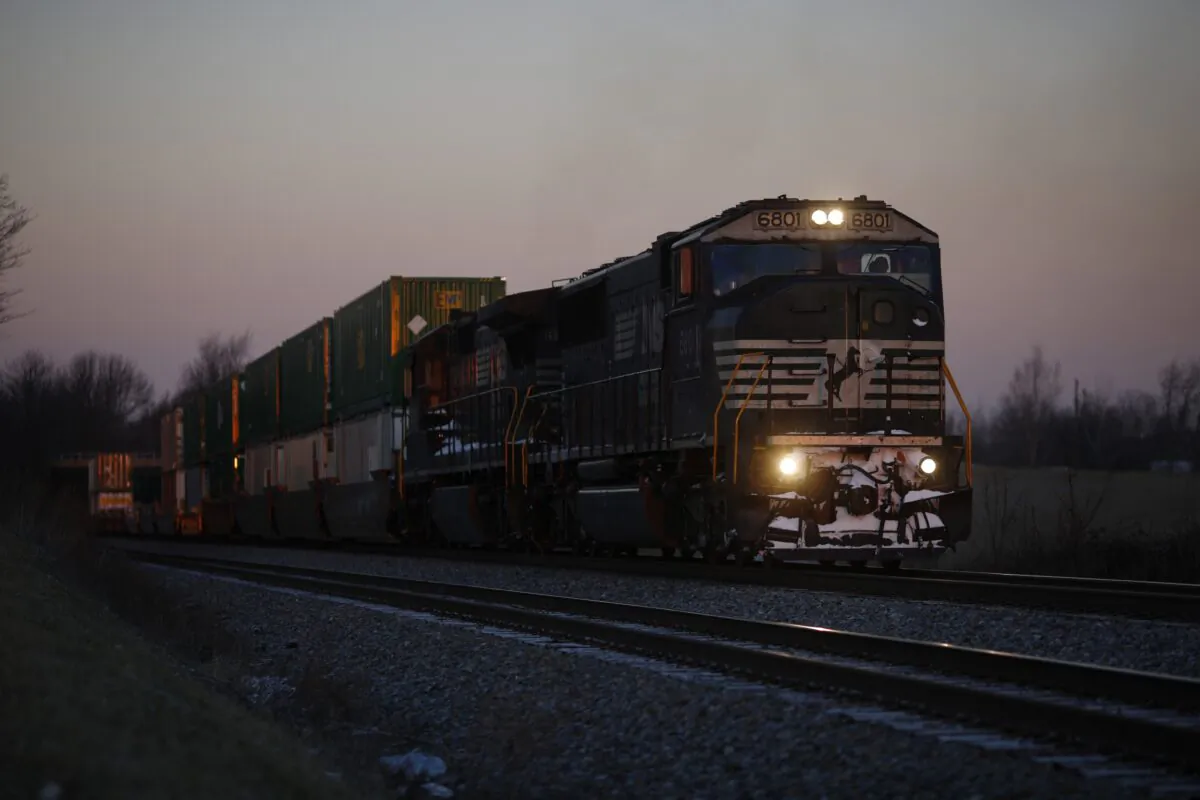 An intermodal freight train is pictured passing through at sunrise in Waddy, Kentucky, on Jan. 7, 2014. (Luke Sharrett/Getty Images)