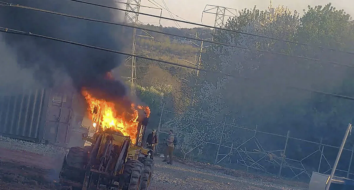 Construction equipment set on fire by a group protesting the planned public safety training center in Atlanta on March 4, 2023. (Atlanta Police Department via AP)