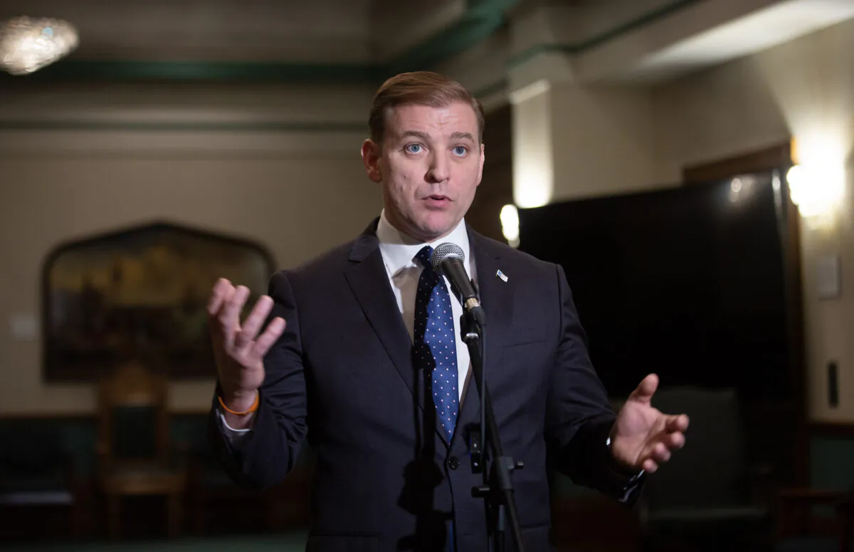 Newfoundland and Labrador Premier Andrew Furey, shown at a press conference in the Confederation Building in St. John's on Feb. 22, 2023, has announced a poverty reduction plan to help children, seniors and low-income workers. (The Canadian Press/Paul Daly)