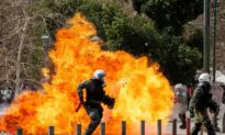 Greeks Protest Over Deadly Train Crash, Station Master Jailed Pending Trial
