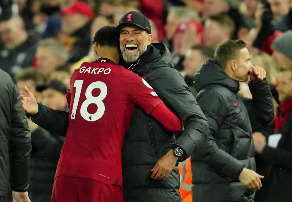 Liverpool's manager Jurgen Klopp celebrates with Liverpool's Cody Gakpo during the English Premier League soccer match between Liverpool and Manchester United at Anfield in Liverpool, England, on March 5, 2023. (Jon Super/AP Photo)