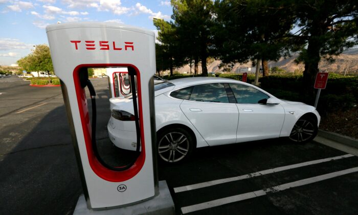 A Tesla Model S charges at a Tesla supercharger station in Cabazon, Calif., on May 18, 2016. (Sam Mircovich/Reuters)