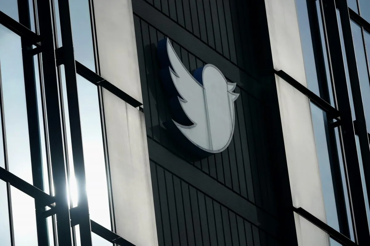 A Twitter logo hangs outside the company's offices in San Francisco on Dec. 19, 2022. (Jeff Chiu/AP Photo)
