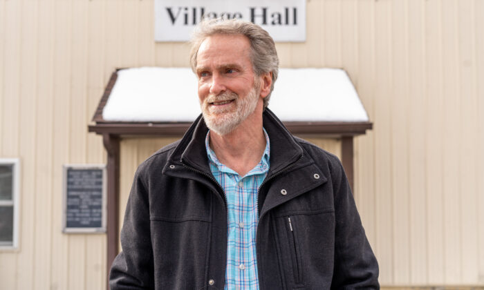 Isaac Palmer in front of the village hall in Otisville, N.Y., on March 1, 2022.