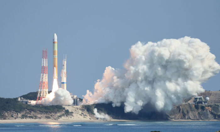 Japan's next generation "H3" rocket, carrying the advanced optical satellite "Daichi 3", leaves the launch pad at the Tanegashima Space Center in Kagoshima, southwestern Japan on March 7, 2023. (STR/JIJI Press/AFP via Getty Images)
