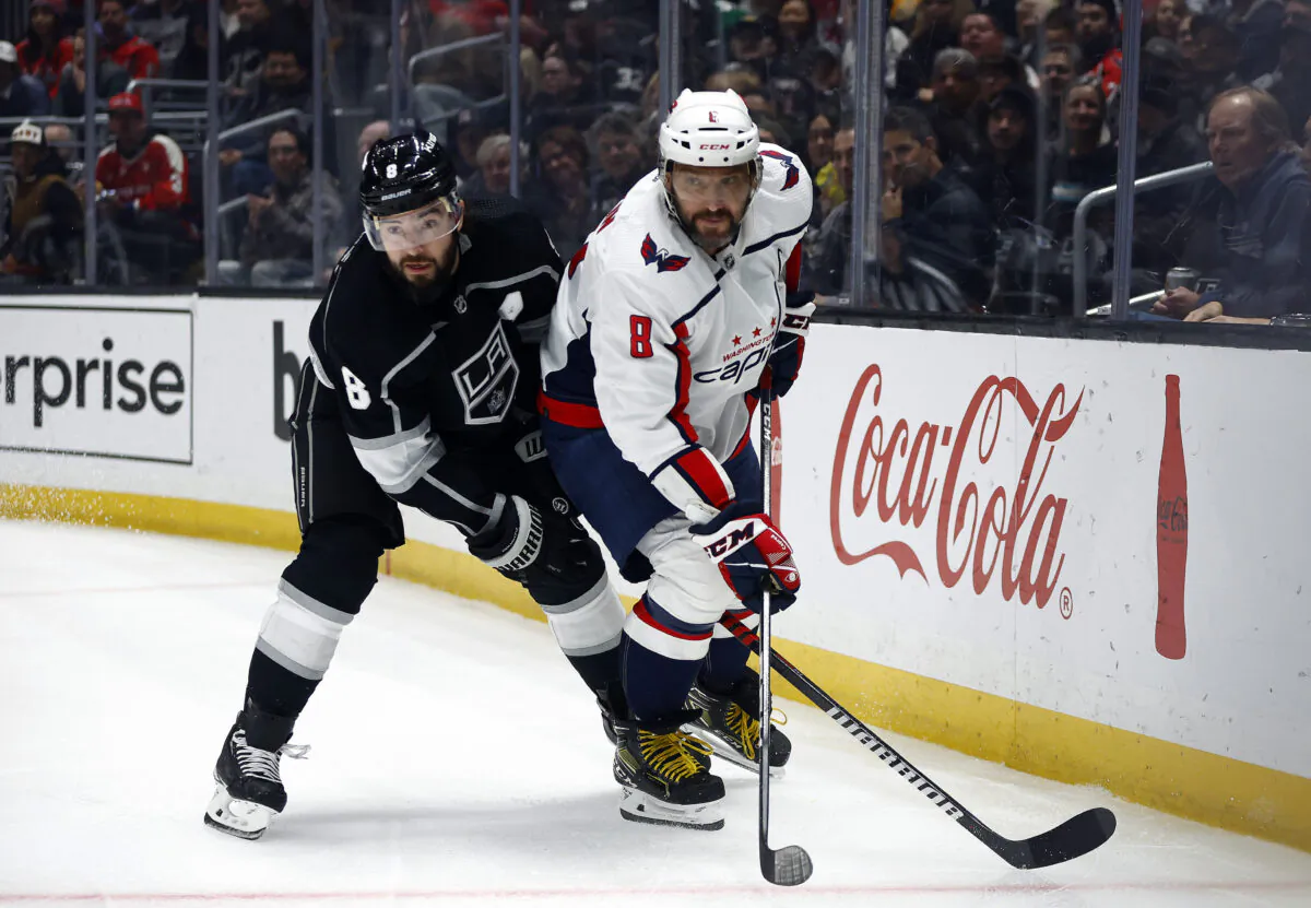 Alex Ovechkin (8) of the Washington Capitals skates for the puck against Drew Doughty (8) of the Los Angeles Kings in the first period in Los Angeles on March 6, 2023. (Ronald Martinez/Getty Images)