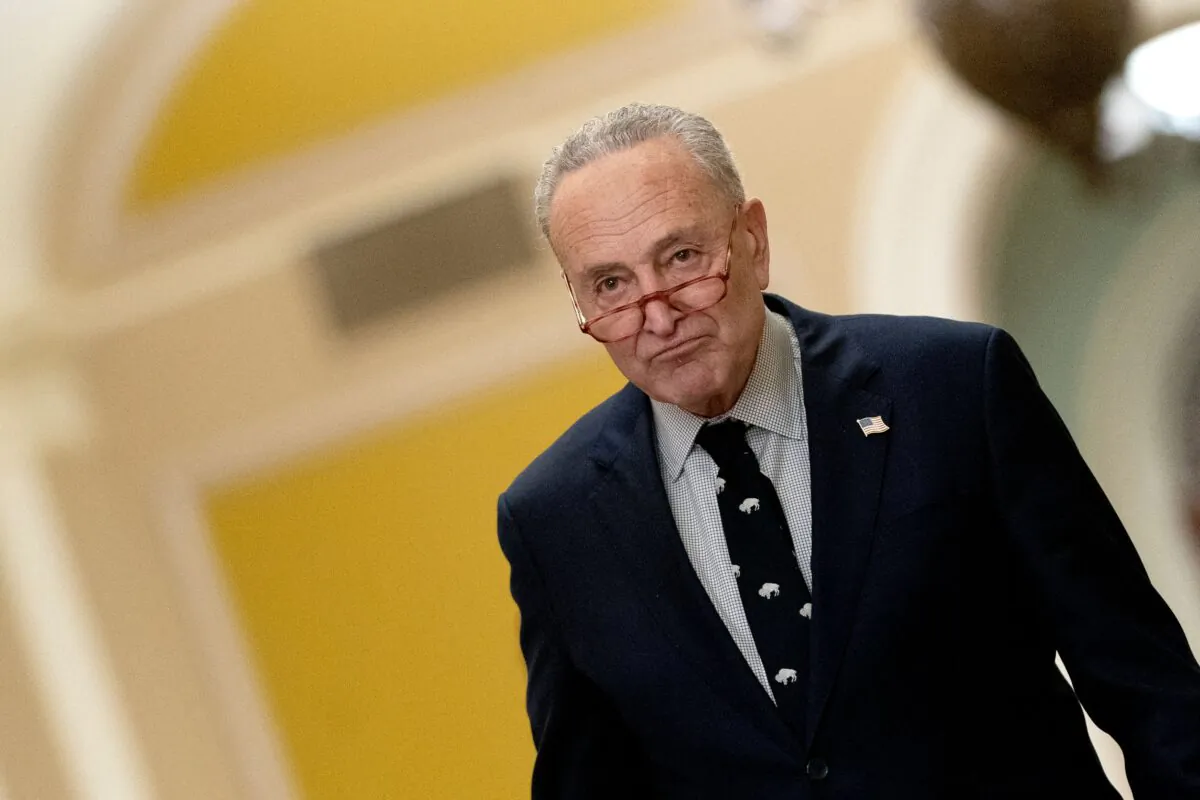 Senate Majority Leader Chuck Schumer (D-N.Y.) walks to speak to members of the media at the US Capitol in Washington on March 2, 2023. (Stefani Reynolds/AFP via Getty Images)