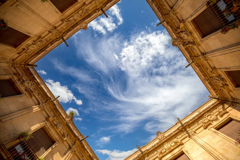 Interior of the arcaded baroque cloister of the Episcopal Palace in Murcia, Spain. (Antonio Lopez Velasco/Shutterstock)