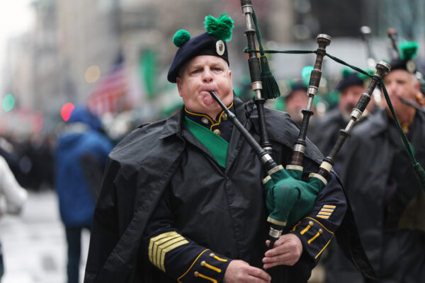 A police band marches in the St. Patrick's Day 