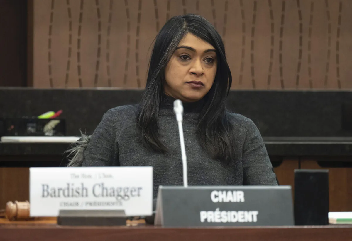 Standing Committee on Procedure and House Affairs chair Bardish Chagger waits to begin a meeting of the  committee, in Ottawa, Feb. 21, 2023. (The Canadian Press/Adrian Wyld)