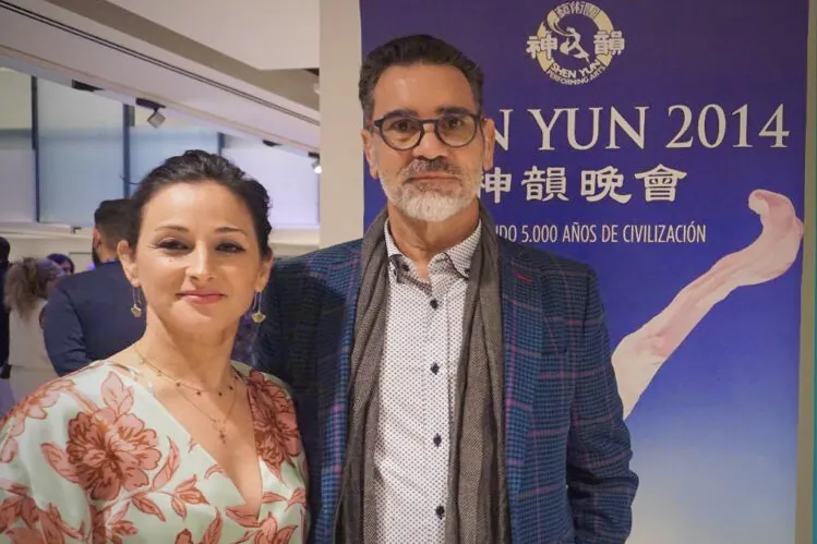 Hotel business owner, Daniel Diaz, and Monica Romero, watch Shen Yun at the Cartuja Center Cite in Sevilla, Spain, on March 7, 2023. (Maya Marinova/The Epoch Times)