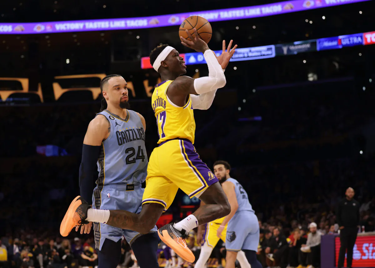 Dennis Schroder (17) of the Los Angeles Lakers shoots after he is fouled by Dillon Brooks (24) of the Memphis Grizzlies during the first half in Los Angeles on March 7, 2023. (Harry How/Getty Images)