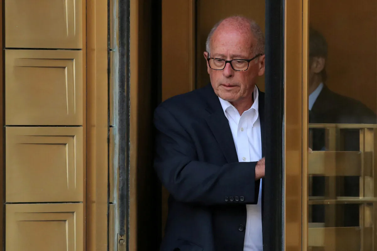 Laurence Doud III, former CEO of Rochester Drug Co-Operative, exits the Manhattan Federal Courthouse in New York on April 23, 2019. (Brendan McDermid/Reuters)