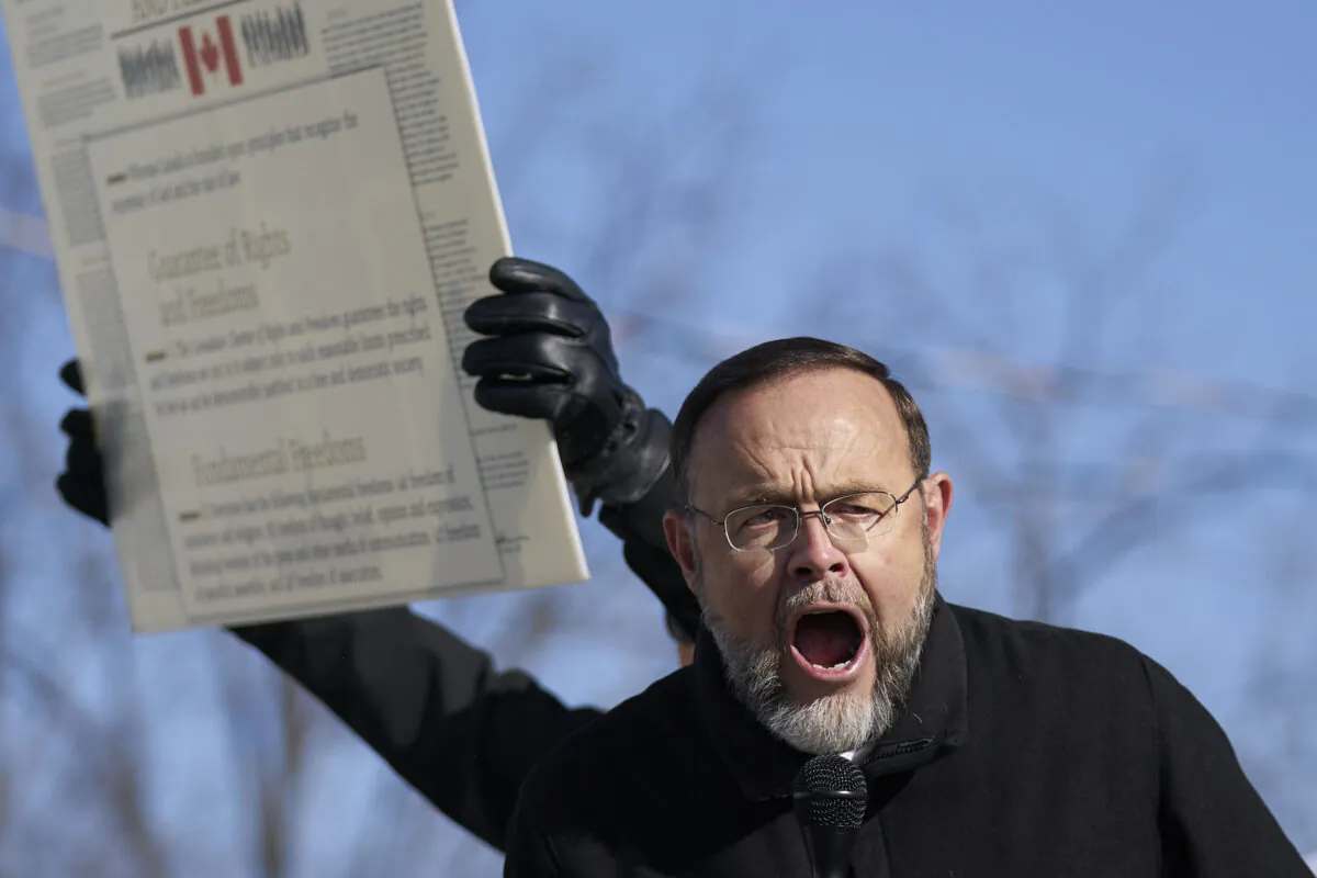 Pastor Henry Hildebrandt speaks at a demonstration against measures taken by public health authorities to curb the spread of COVID-19, in St. Thomas, Ont., on Nov. 14, 2020. (Geoff Robins/The Canadian Press)