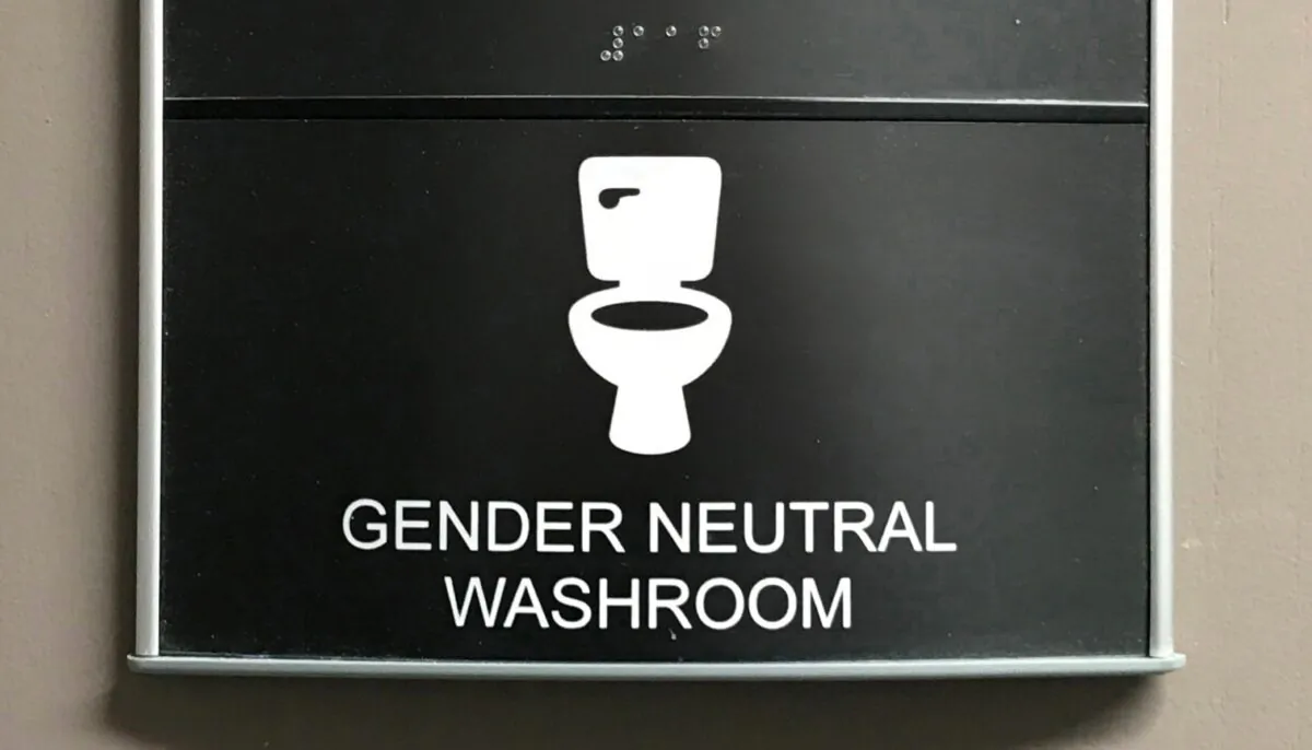 A file photo of a gender neutral washroom sign. (Jonathan Hayward/The Canadian Press)