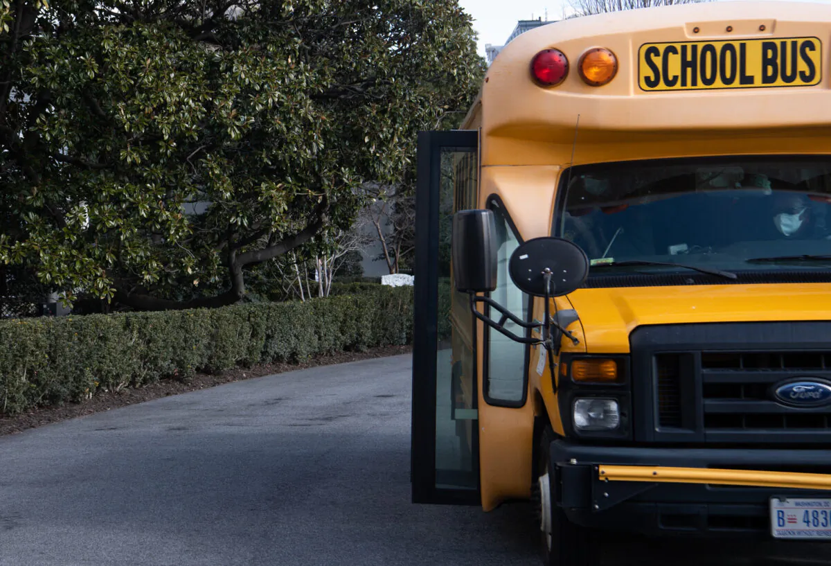 A school bus in a file photo. A bill introduced in Colorado would pave the way for schools to conduct annual mental health checks for students. (SAUL LOEB/AFP via Getty Images)