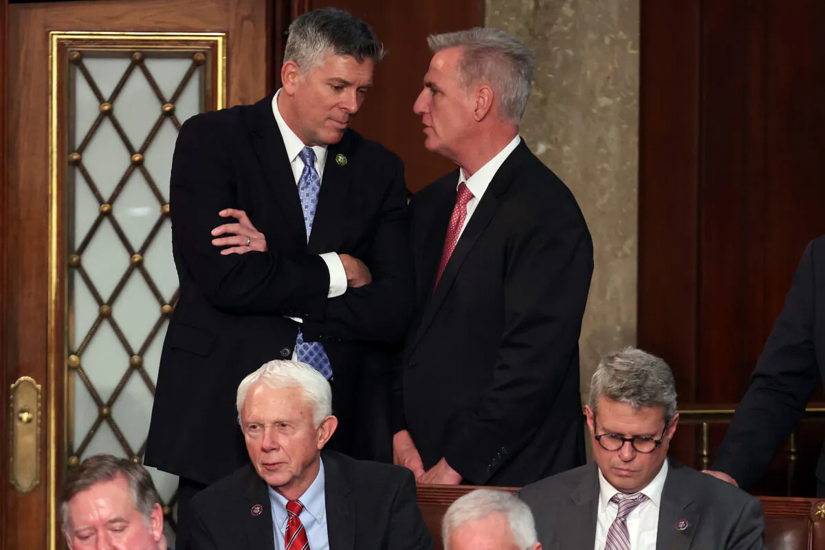 U.S. House Republican Leader Kevin McCarthy (R-Calif) (R) talks to Rep.-elect Darin LaHood (R-Ill.) in the House Chamber during the third day of elections for Speaker of the House at the U.S. Capitol Building on January 05, 2023 in Washington. (Win McNamee/Getty Images)