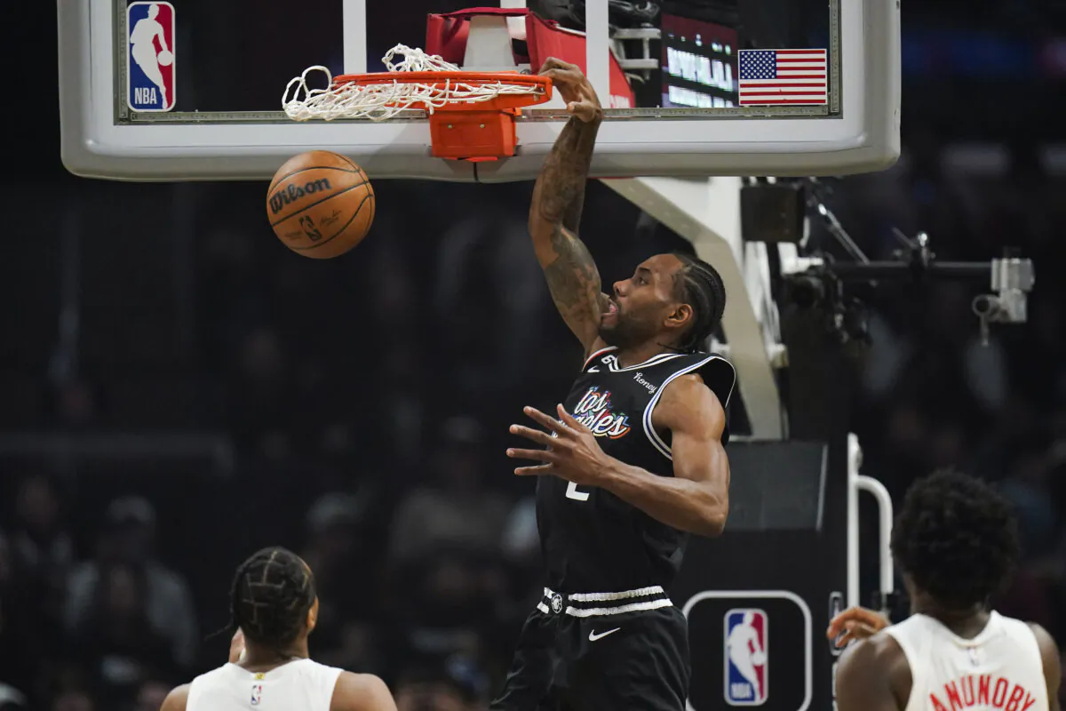 Los Angeles Clippers' Kawhi Leonard (2) makes a dunk during first half of an NBA basketball game against the Toronto Raptors in Los Angeles March 8, 2023. (Jae C. Hong/AP Photo)