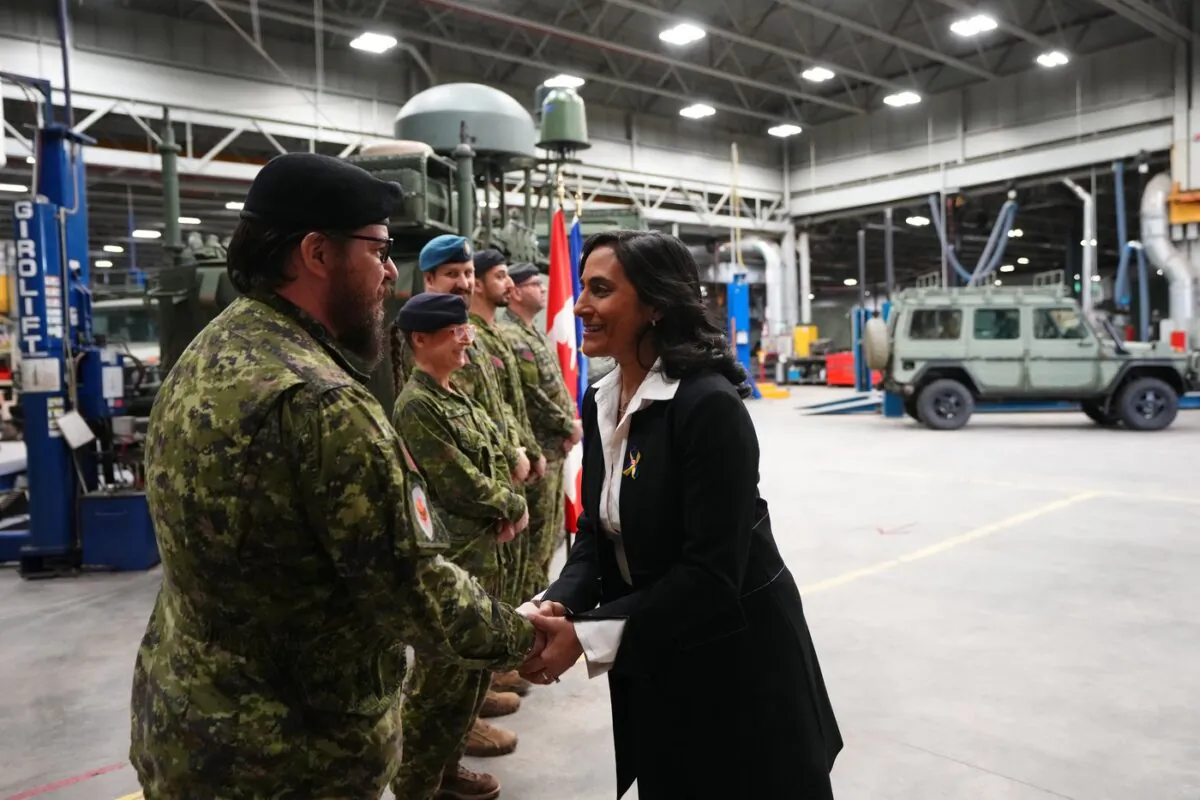Defence Minister Anita Anand greets Canadian Forces personnel at CFB Kingston, in Kingston, Ont., on March 7, 2023. (The Canadian Press/Sean Kilpatrick)