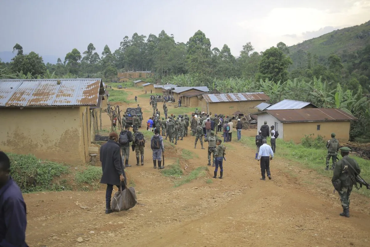 Democratic Republic of Congo Defence Forces gather in the North Kivu province village of Mukondi on March 9, 2023. (Socrate Mumbere/AP Photo)