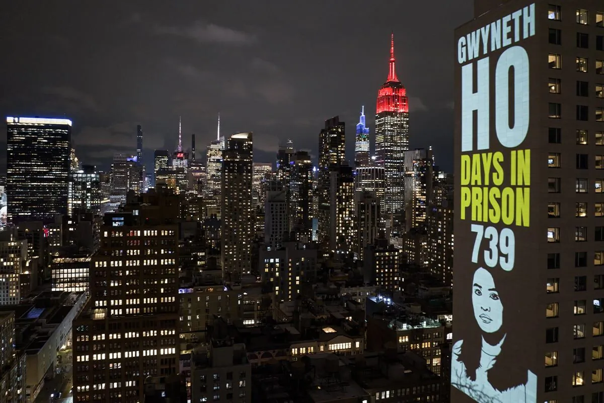 On the exterior of a high-rise building in Manhattan, New York, the faces of the female democrats are projected on the evening of International Women's Day on March 8, 2023. The photo shows former Stand News reporter Gwyneth Ho Kwai-lam and the number of days she has been remanded: 739. (Courtesy of The Committee for Freedom in Hong Kong Foundation