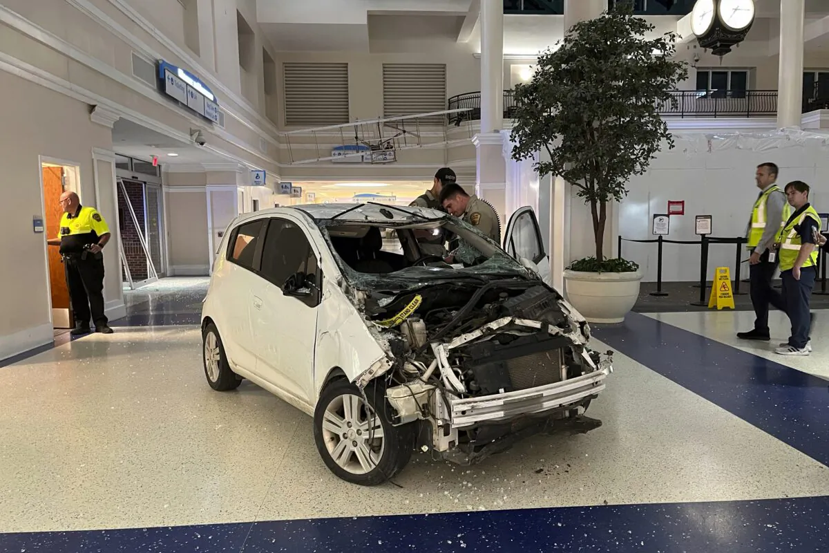 A vehicle had breached the fence line at the airport and drove onto the tarmac at the Wilmington International Airport in Wilmington, N.C., on March 9, 2023. (New Hanover County Sheriff’s office via AP)
