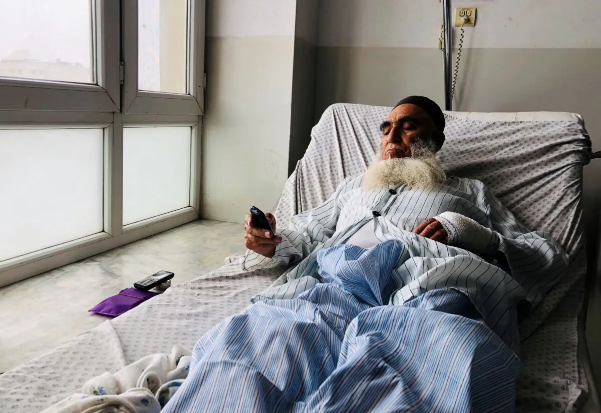 A wounded man receives treatment at a hospital after a bomb blast in Mazar-e Sharif, the capital city of Balkh Province, in northern Afghanistan, on March 9, 2023. (Abdul Saboor Sirat/AP Photo)