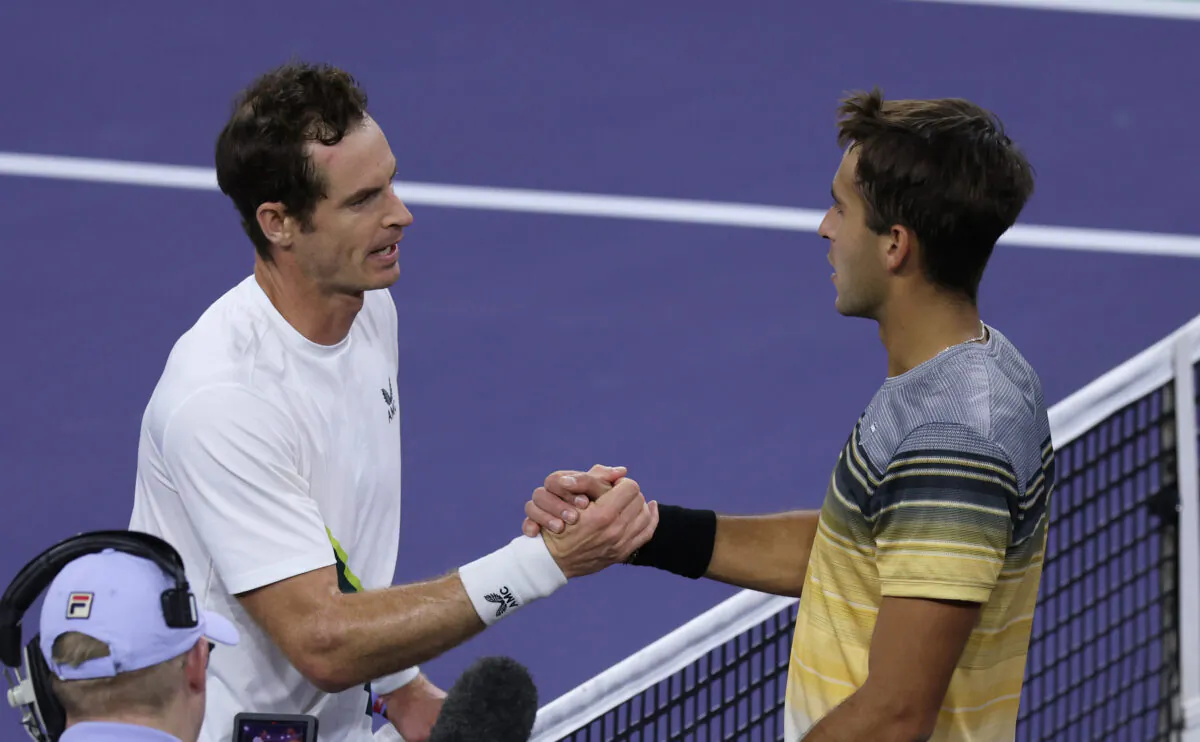 Andy Murray of Great Britain shakes hands at the net after victory in his match against Tomas Martin Etcheverry of Argentina in the first round during the BNP Paribas Open in Indian Wells, Calif., on March 9, 2023. (Clive Brunskill/Getty Images)