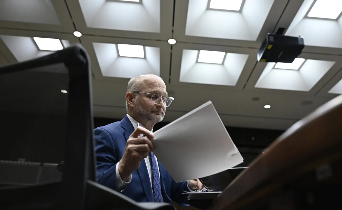 Justice Minister David Lametti prepares to appear before the Standing Committee on Justice and Human Rights in Ottawa on March 6, 2023. (The Canadian Press/Justin Tang)