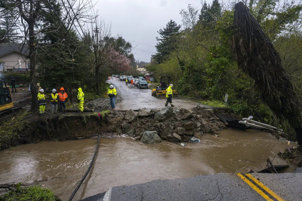 Crews assess storm damage, which washed out North Main Street in Soquel, Calif., on March 10, 2023. (Nic Coury/AP Photo)