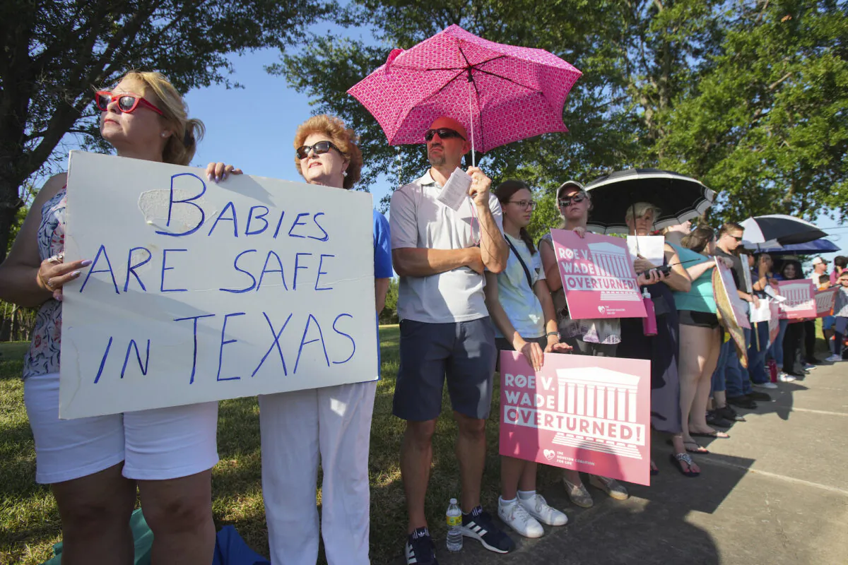 Pro-life demonstrators gather outside Planned Parenthood in Houston on June 24, 2022. (Brett Coomer/Houston Chronicle via AP)