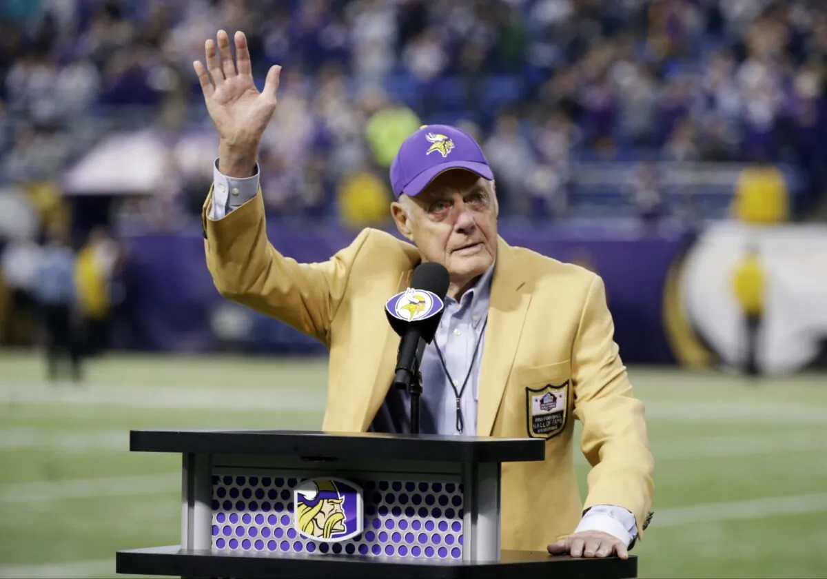 Former Minnesota Vikings Hall of Fame coach Bud Grant waves a final goodbye to the Metrodome during ceremonies following the Vikings NFL football against the Detroit Lions in Minneapolis on Dec. 29, 2013. (Jim Mone/AP Photo)
