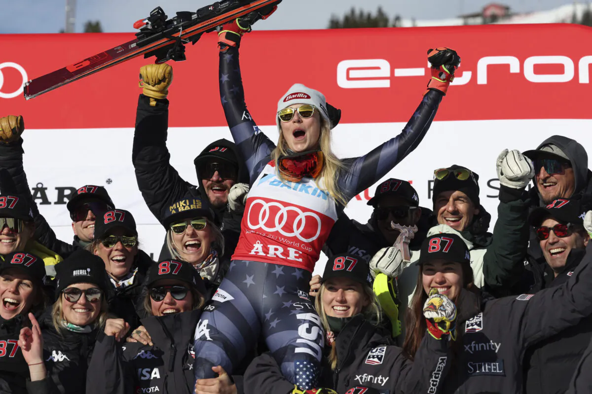 The winner United States' Mikaela Shiffrin celebrates with the team after an alpine ski, women's World Cup slalom, in Are, Sweden, on March 11, 2023. (Alessandro Trovati/AP Photo)