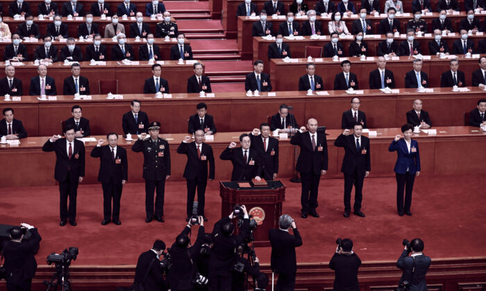 (L-3)Li Shangfu, China's swears an oath at the Great Hall of the People in Beijing on March 12, 2023. (Noel Celis / AFP via Getty Images)