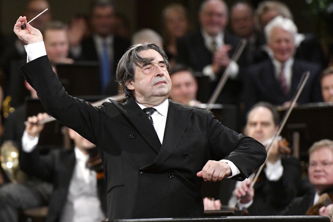 Italian Maestro Riccardo Muti conducts the Vienna Philharmonic Orchestra during the traditional New Year's concert on Jan. 1, 2018, in Vienna, Austria. (Photo by HANS PUNZ/APA/AFP via Getty Images)
