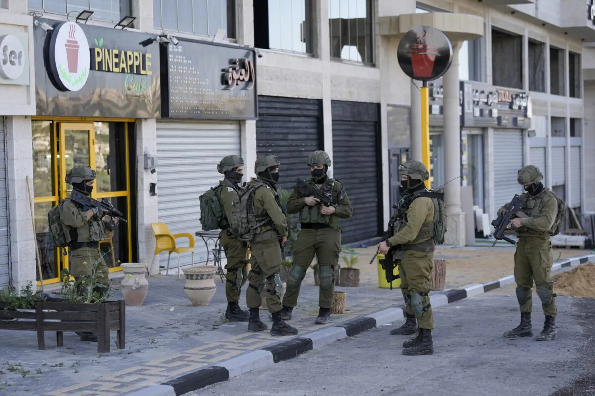 Israeli soldiers operate in village of Sarra near the West Bank city of Nablus on March 12, 2023. (Majdi Mohammed/AP Photo)