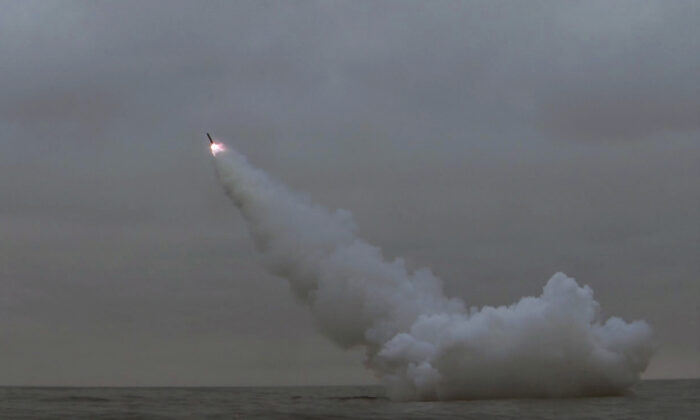 North Korea fires two missiles from a submarine striking an underwater target, according to state media, at an undisclosed location in North Korea, on March 12, 2023, in this photo released by North Korea's Korean Central News Agency (KCNA). (KCNA via Reuters)
