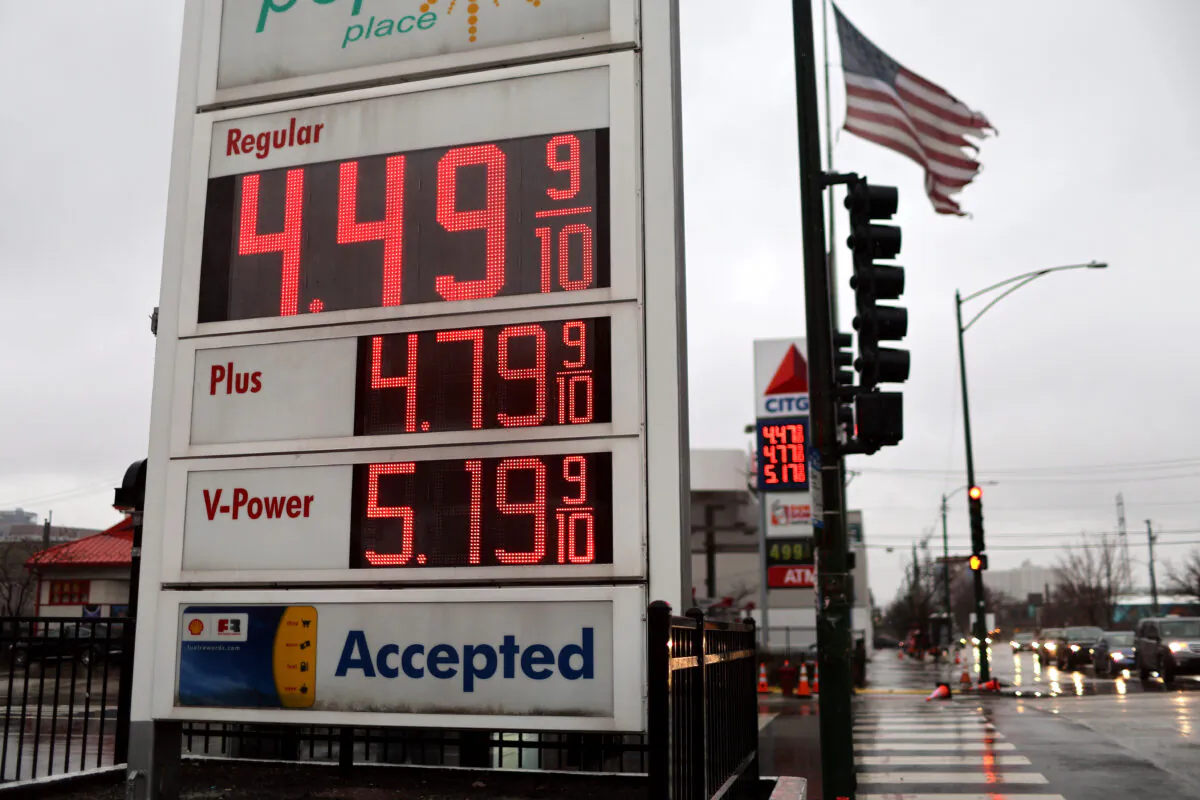 Gas prices are displayed on a sign at a gas station in Chicago on Feb. 22, 2023. (Scott Olson/Getty Images)