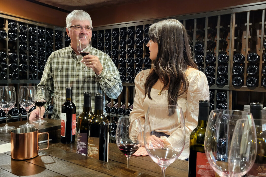 Mark LaPierre and his daughter, Marnie, sample wines at their new LaPierre Farms and Winery in Zillah, Washington. (Photo courtesy of Jim Farber)