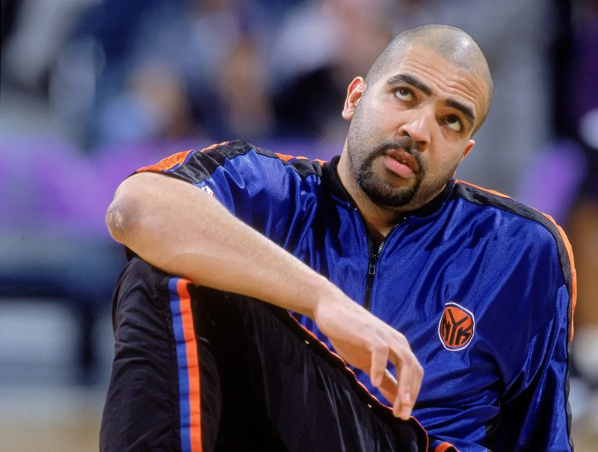 Felton Spencer #50 of the New York Knicks stretches out on the court before the game against the Milwaukee Bucks at the Bradley Center in Milwaukee, Wis., on Jan. 23, 2001. (Jonathan Daniel/Allsport via Getty Images)